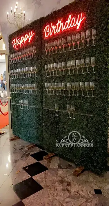 Grass wall with champagne wall and LED sign rental for events Chicagoland IL