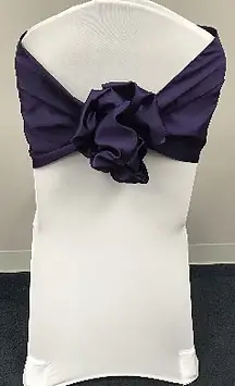 Satin flower chair sash rental for weddings and showers in Chicagoland